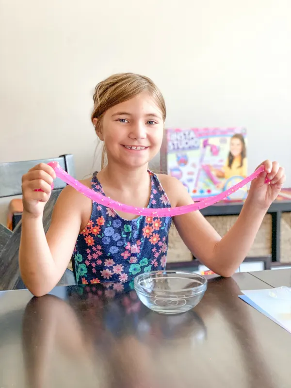 Girl playing with Instastudio Slime Kit