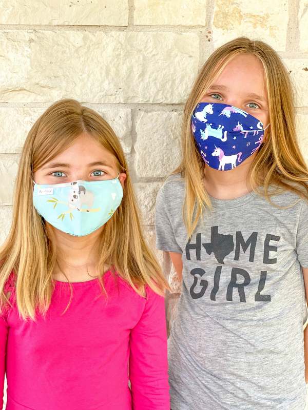 Two girls wearing Funkins face masks for back to school 2020