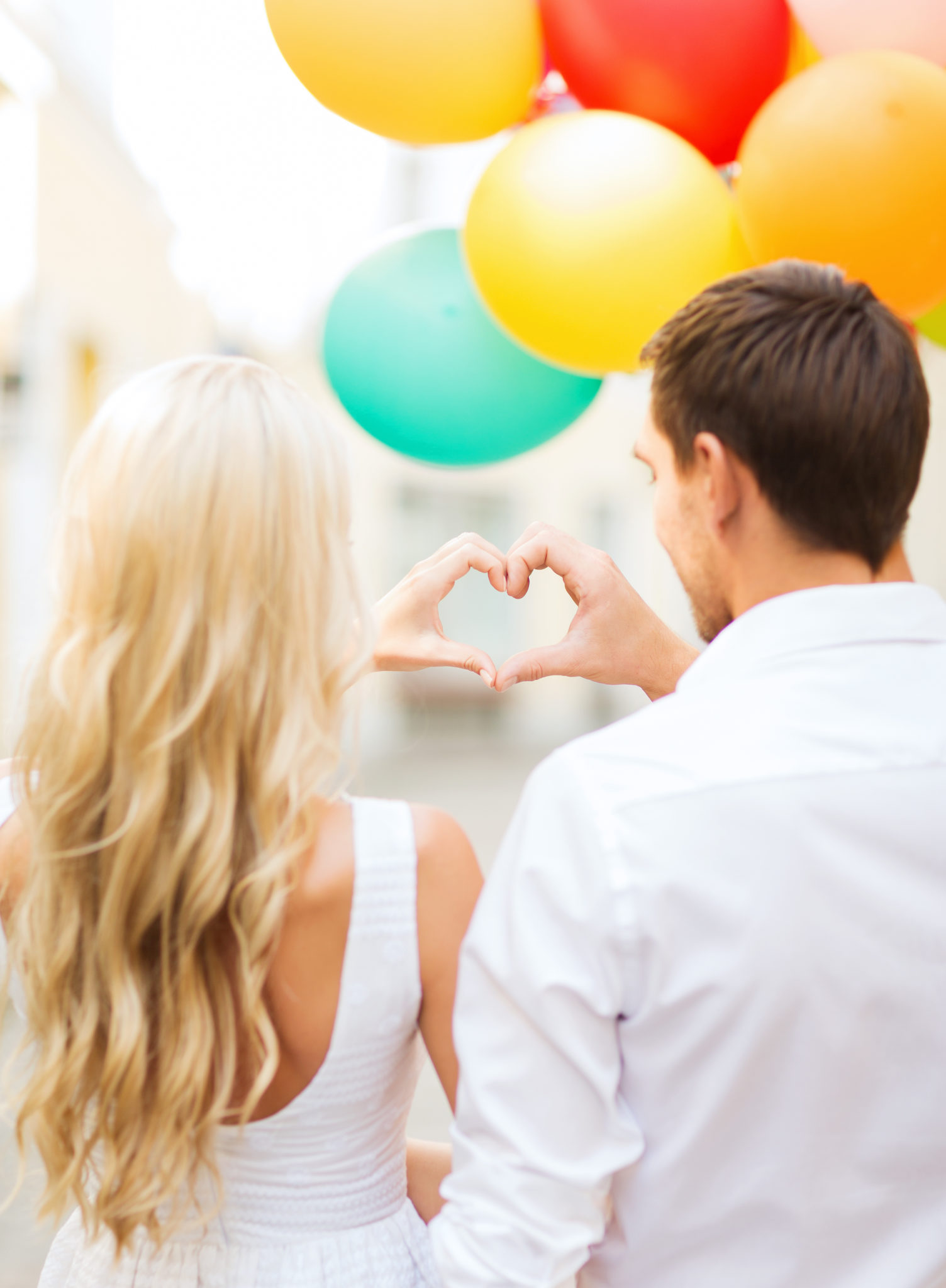 couple with colorful balloons
