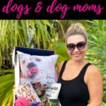 woman holding box of dog themed items with gifts ideas for dogs and dog mom text overlay