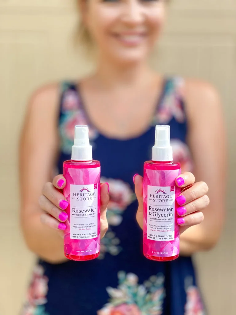 Heritage Store Rosewater bottles in womans hands