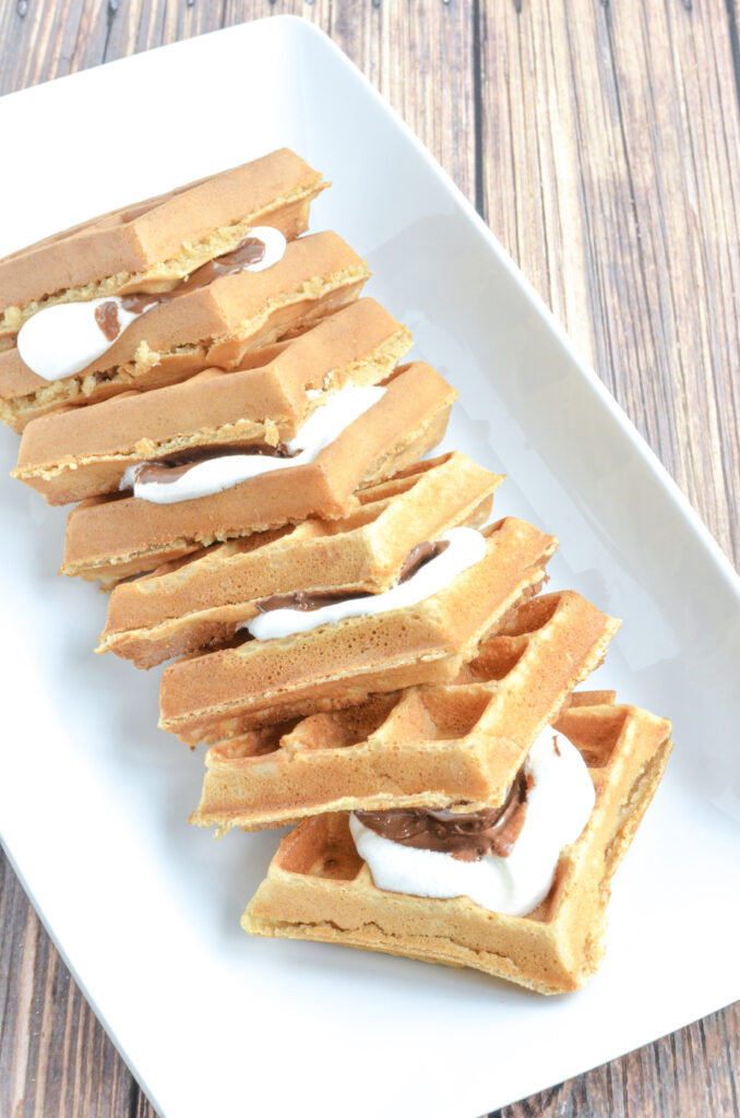 waffles stuffed with marshmallows, chocolate, and graham crackers
